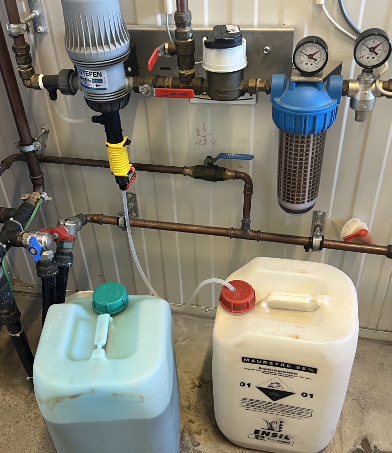 Syrekanne og doseringsanlegg